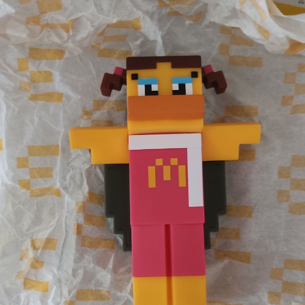 Pixelated Character Action Figure with Wings